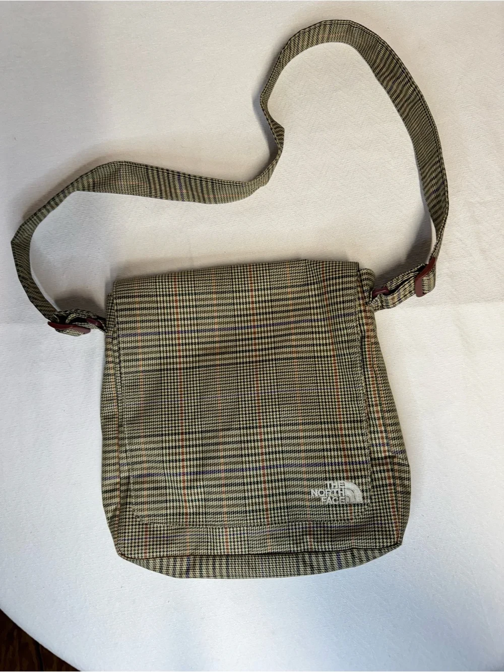 The North Face compact messenger
